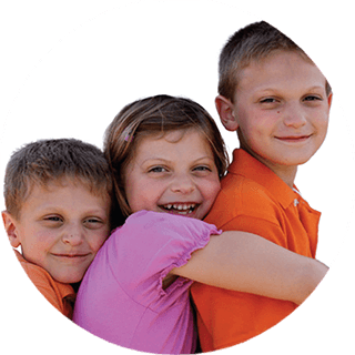 Three kids hugging each other